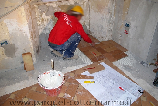 pavimenti in cotto;posa fascia laterale