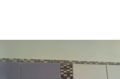 Rivestimenti semplici con inserimento di mosaici